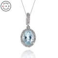 Aquamarine and Diamond Halo Pendant in 14K (image for) Aquamarine and Diamond Halo Pendant in 14K