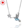 Blue Topaz and Diamond Humming Bird and Flower Pendant (image for) Blue Topaz and Diamond Humming Bird and Flower Pendant